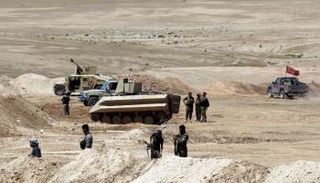 مليشيا الحشد في صحراء مدينة الحضر (الفرنسية)