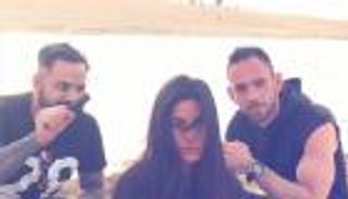 بالصور.. كاترينا كيف تصور "تايجر" في أبوظبي