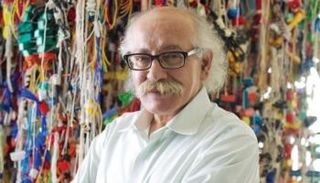 الفنان الإماراتي الراحل حسن شريف