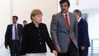المستشارة الألمانية وأمير قطر -أرشيفية