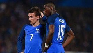 بوجبا يسخر من توقف مفاوضات يونايتد مع جريزمان