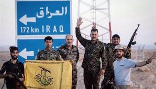 مليشيا من الحشد الشعبي على الحدود بين سوريا والعراق
