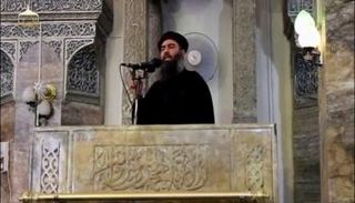 البغدادي يعلن قيام دولة الخلافة من على منبر النوري - رويترز 