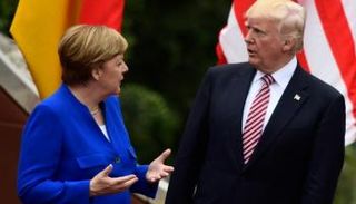 ميركل والرئيس الأمريكي ترامب في قمة مجموعة السبع (الفرنسية)