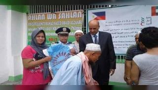  دبي الخيرية توزع سلالا غذائية في الفلبين