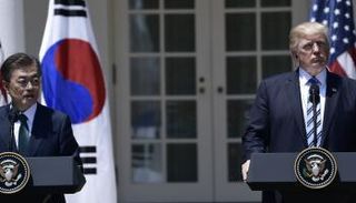 ترامب ونظيره مون - رويترز