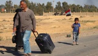 تسبب الإرهاب الذي تموله قطر في تشريد الملايين (الصورة من الفرنسية)