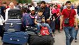 داعش يسبب أزمة إنسانية في الرقة و50 ألفا عالقون