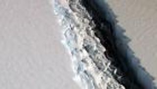 بالصور..انفصال أكبر جبل جليدي عن "أنتاركتيكا"