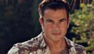 معجبو عمرو دياب يفكون شفرة وشمه الجديد