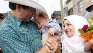 جاستن ترودو يلتقي طفلا سوريا سمي على اسمه