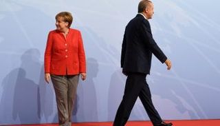 ميركل وأردوغان علاقة متوترة منذ الانقلاب الفاشل - رويترز