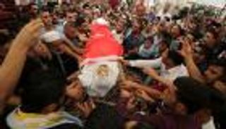 بالصور..  تشييع جثمان شهيد السفارة بالأردن 