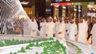 بالصور.. محمد بن راشد يزيح الستار عن المجسم الضخم لبرج خور دبي