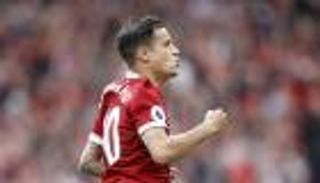 أوين ينصح ليفربول بالتمسك بكوتينيو