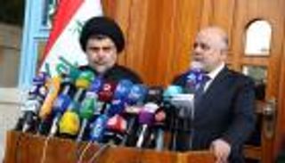 العبادي رافضًا تحذيرات الصدر: الحشد الشعبي باقِ