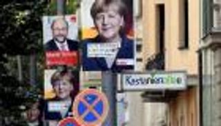 حليف لميركل يسحب شرط سقف اللاجئين للتعاون معها