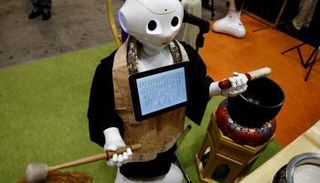  الروبوت بديل للكهنة البوذيين في الجنائز