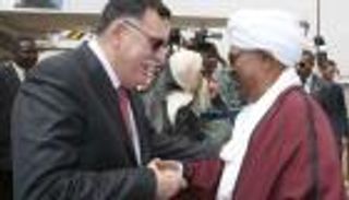 البشير والسراج يؤكدان حرصهما على تعزيز التعاون والتصدي للهجرة