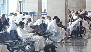  سفر 290 حاجا من أسر شهداء الجيش والشرطة بمطار القاهرة