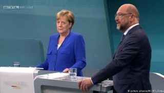 ميركل وشولتز