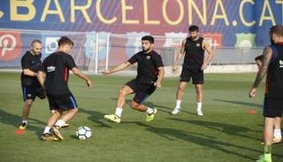 سواريز وباولينيو يدعمان برشلونة قبل موقعة إسبانيول