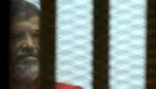 بالفيديو.. حكم نهائي بالسجن المؤبد لمرسي لتخابره مع قطر