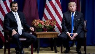 الرئيس الأمريكي دونالد ترامب وأمير قطر تميم بن حمد