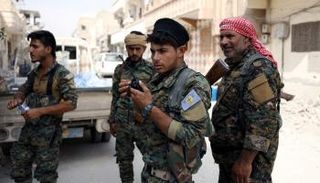 جنود من قوات سوريا الديمقراطية في الرقة