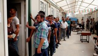 أحد مراكز الاقتراع في استفتاء كردستان - رويترز