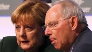 شويبله وميركل - رويترز