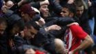 سيميوني يدعم كوستا رغم طرده