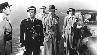  إنجريد برجمان وهامفري بوجارت وكلود رين وبول هنرايد في آخر مشهد للفيلم