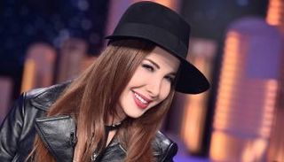 نانسي عجرم تقترب من عرش إليسا على تويتر
