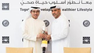 الهاشمي والعبار عقب توقيع الاتفاقية