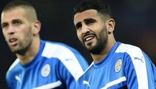 الجزائريان رياض محرز وإسلام سليماني