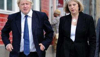  وزير الخارجية البريطاني السابق بوريس جونسون وتيريزا ماي -صورة أرشيفية