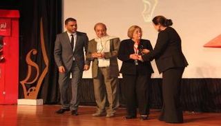 أثناء تكريم الممثل السوري دريد لحام