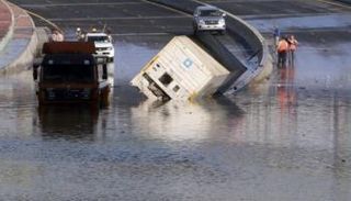 الأمطار في الكويت - أ.ف.ب