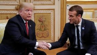 الرئيس الفرنسي ونظيره الأمريكي خلال لقائهما في قصر الإليزيه