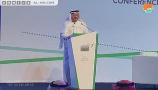 قرقاش أثناء إلقاء كلمته في المؤتمر