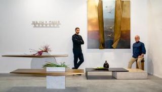 عمر نقاش ووالده وسط أعمالهما في أسبوع دبي للتصميم