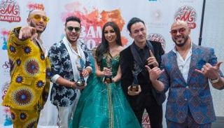 المغربية دنيا بطمة تتألق في حفل الـ"باما" بفستان من توقيع منى المنصوري