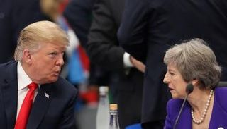 ماي والرئيس الأمريكي خلال قمة العشرين