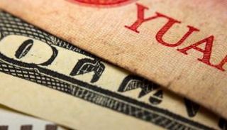 الصين ترفع سعر صرف اليوان مقابل الدولار