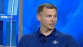 رائد فضاء نجا من محاولة إطلاق فاشلة يؤكد استعداده لرحلة جديدة