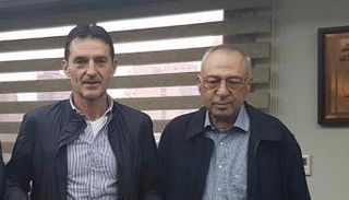 يانيفسكي مع رئيس النادي الإسماعيلي