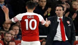 أوناي إيمري ومسعود أوزيل