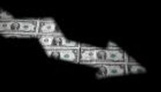 الدولار يهبط بعد بوادر مواجهة بين البيت الأبيض والمركزي الأمريكي