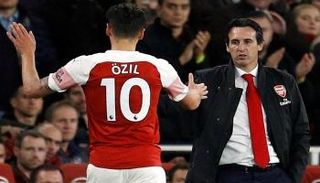 أوناي إيمري ومسعود أوزيل